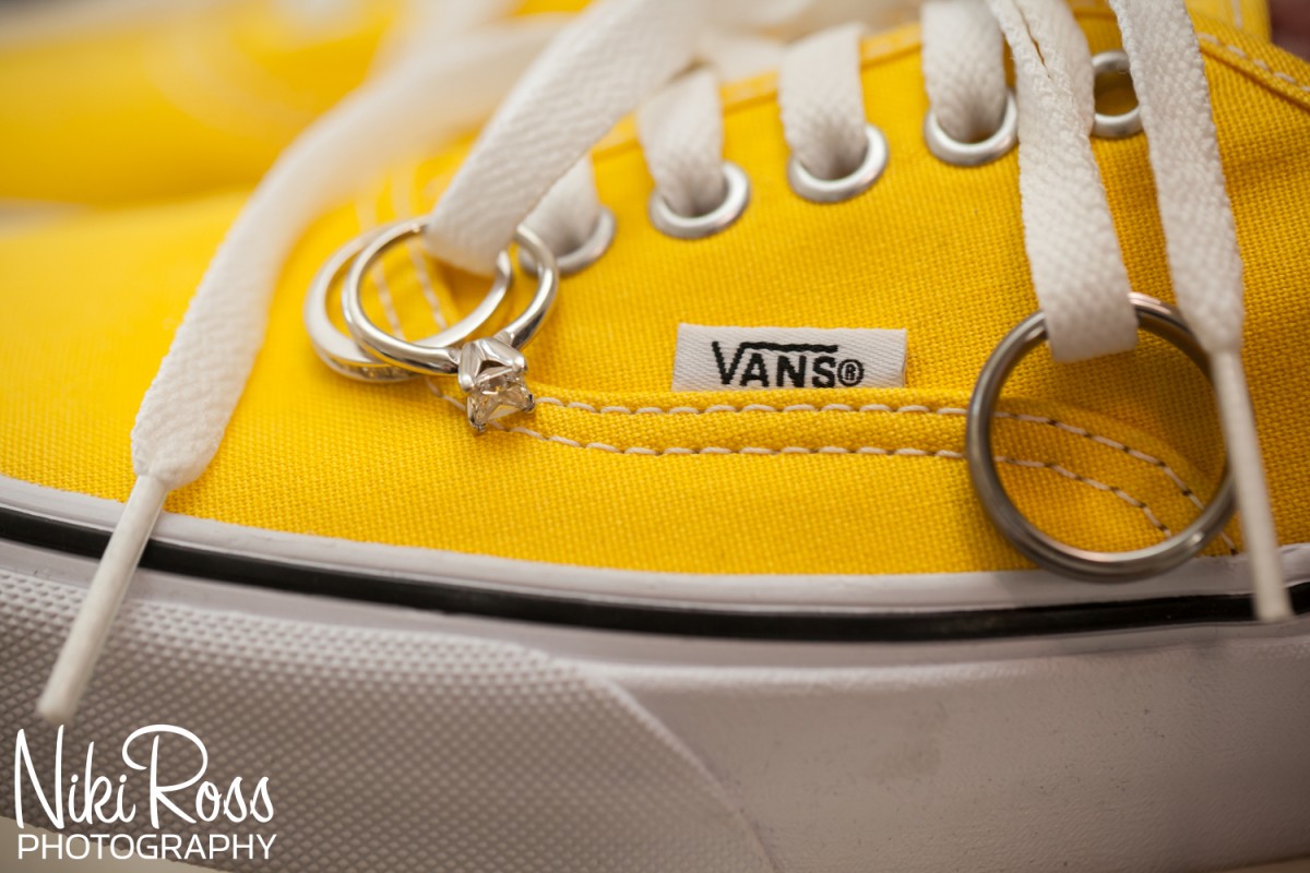 Wedding rings with the brides yellow vans sneakers. http://nikirossphotography.com